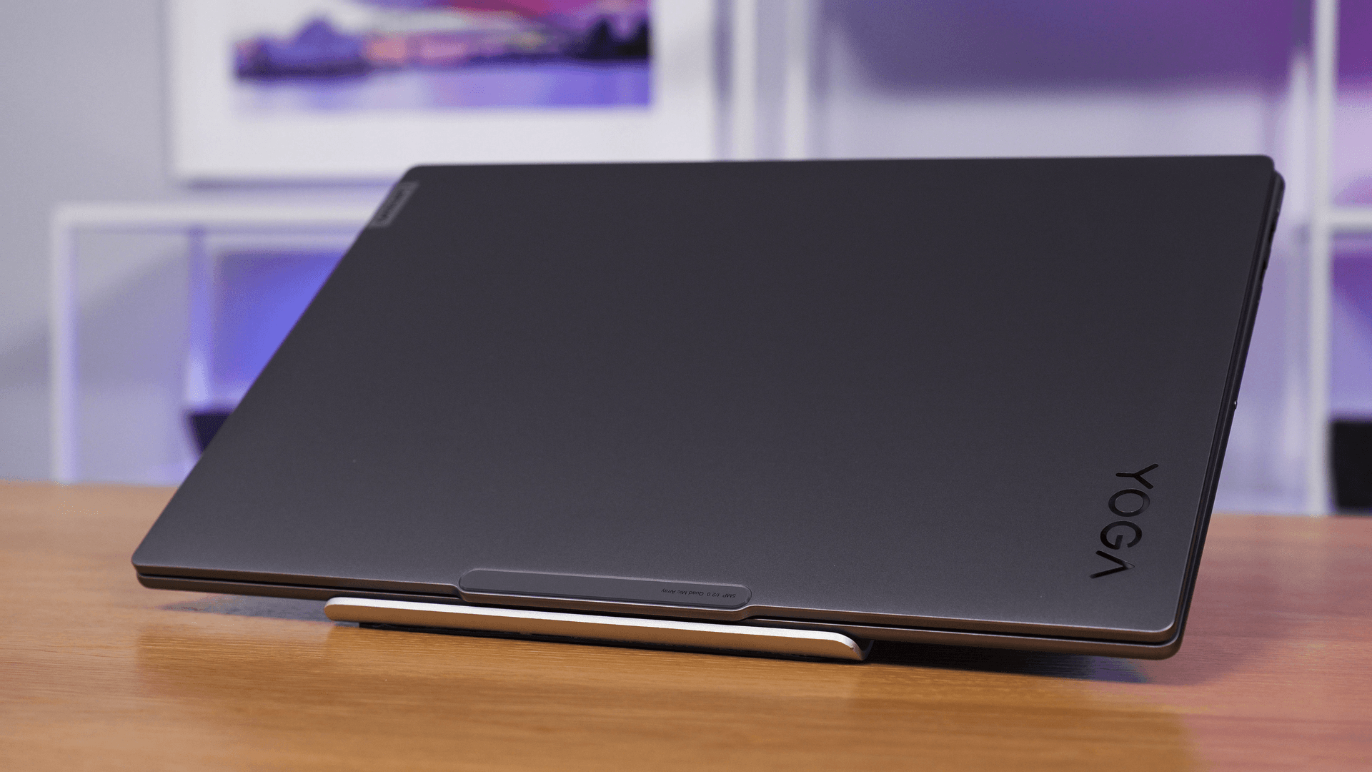 Lenovo Yoga Pro 9i on a stand with its lid closed